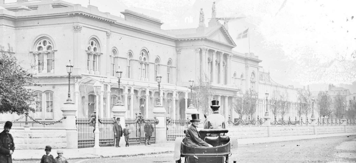 Unbeknownst to most Dubliners, the inventive gate brackets of the National Concert Hall pre-date the building itself. These, along with the vigorously rock-faced boundary wall and chains, were pragmatically incorporated from the previous 1865 'Exhibition Palace' on the site.