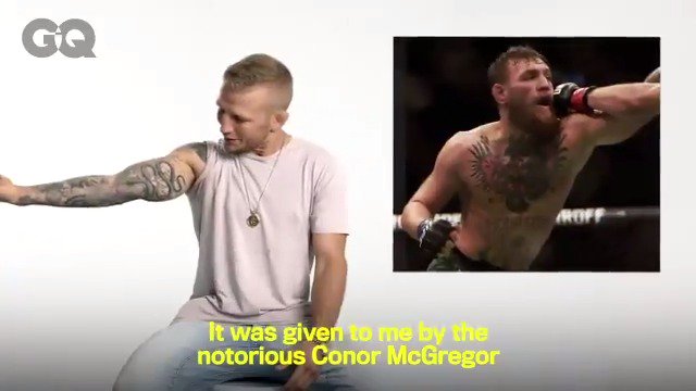 .@UFC champ @TJDillashaw shows off his ink