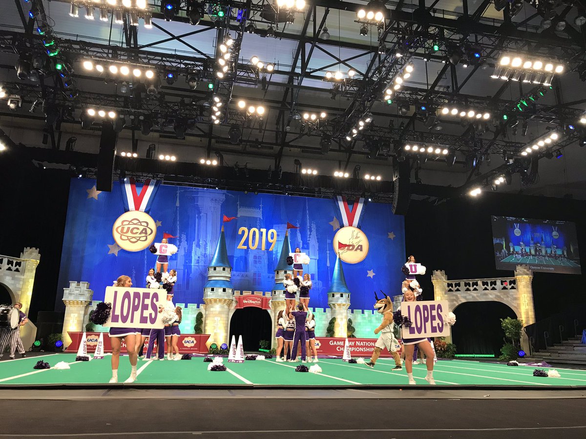 Talk about school pride! The Lopes from <a href="/GCUCheerleaders/">GCU Cheerleaders</a> brought their 🥁 line, flags, and energy to the green mat! #UCAGameDay