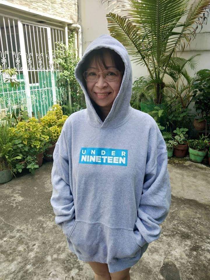 Christian's mom wearing Under Nineteen 