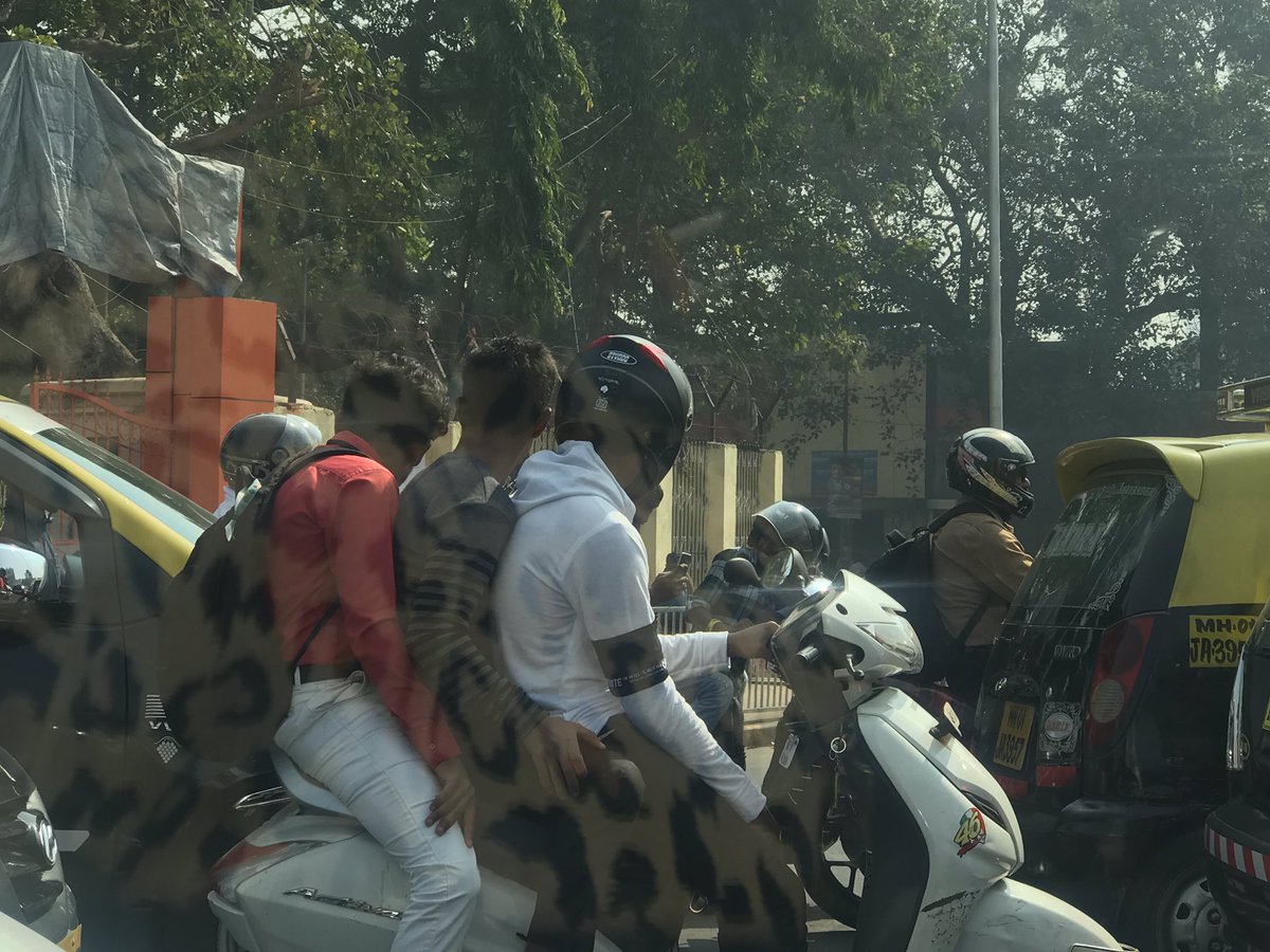pratikvaidya's tweet image. Since when did @MumbaiPolice @mumbaitraffic allow triple seat in mumbai . #hajiali signal going towards #kempscorner . #dangerous #driving #SafetyFirst #helmet