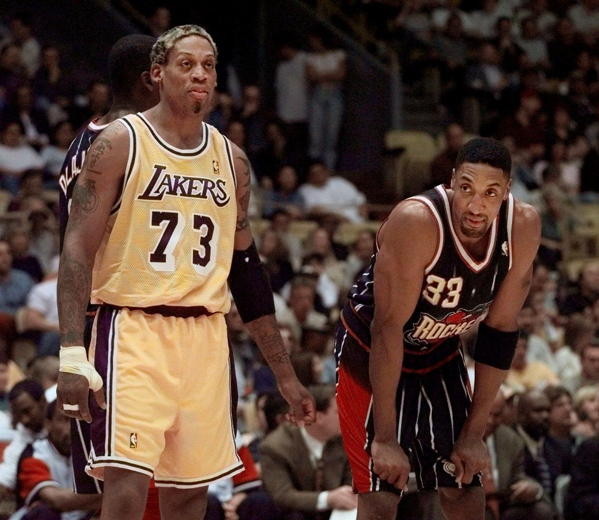 On Feb. 28, 1999, the dispersal of the Bulls took centerstage in L.A., as Rodman's Lakers hosted Pippen's Rockets, with Michael Jordan watching courtside.Note the bandage on MJ's right pointer finger. He severed a tendon in January '99 cutting a cigar. https://www.blogabull.com/2017/3/24/15044772/the-true-story-of-jerry-krause-breakup-of-the-bulls-michael-jordan-phil-jackson-scottie-pippen