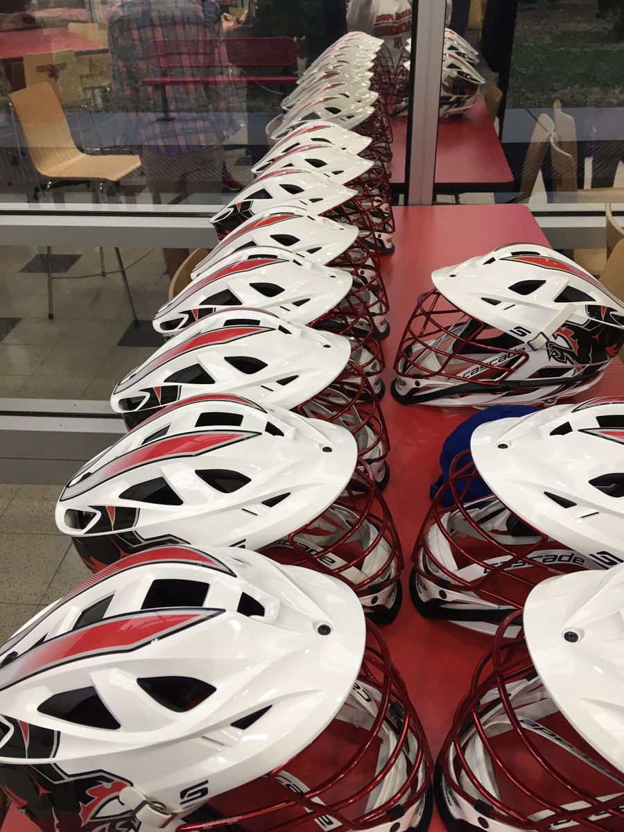 Mrs_C19's tweet photo. @NAFO_Lacrosse getting season ready with decal party.  Helmets are looking good!  #oneteamonemission https://t.co/Lah4X8iyDl