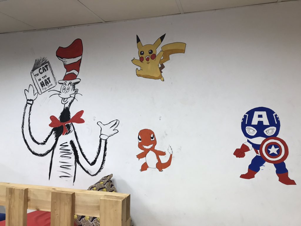 LibraryKirkL's tweet photo. Always amazed by those with artistic talent. Our walls are starting to look amazing. We are lucky our secondary students are so great! work in progress. #istafricalearns #istreads #istpaints https://t.co/2FBziKfNQM