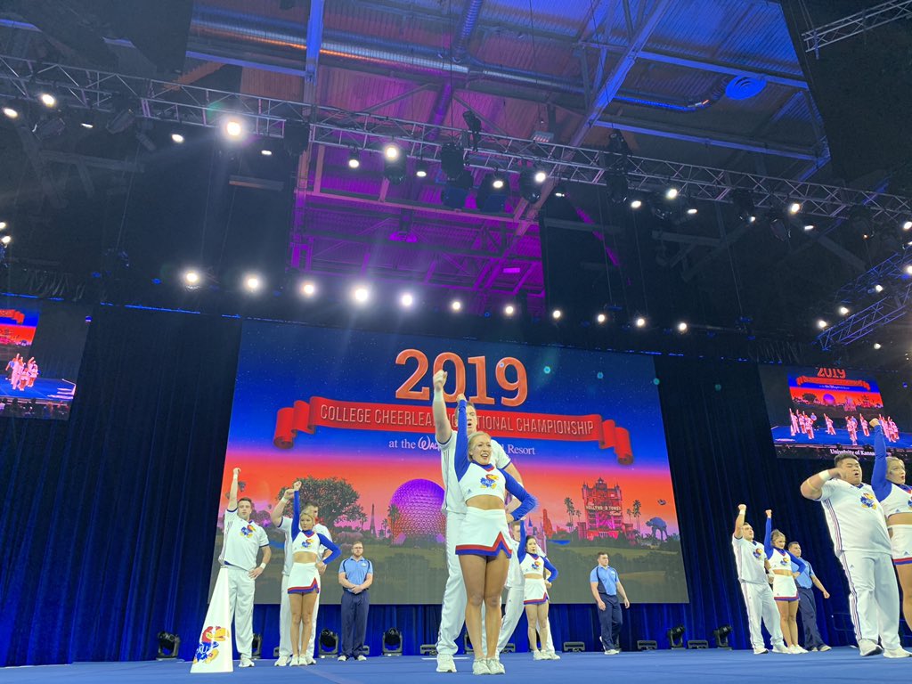 UCAupdates's tweet photo. Scream it from the rooftops, KANSAS is back! Welcoming back @KUcheer to the DIA #UCANationals! Go Jayhawks! 💙❤️ https://t.co/NIzykUNVKD