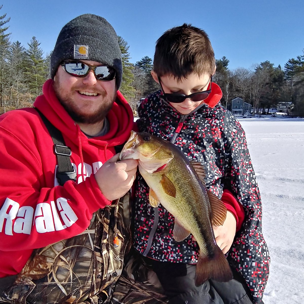 WMOMedia's tweet photo. There getting bigger! Wild Maine Outdoors Pro-Staff Director, Jason Coombs and his son Hunter, are on a roll #icefishing #largemouthbass #bassfishing #fishing #fishingfamily #outdoors #outdoorlifestyle #exploremaine #wildmaineoutdoorstv #huntchanneltv https://t.co/CF4uwyfIhl