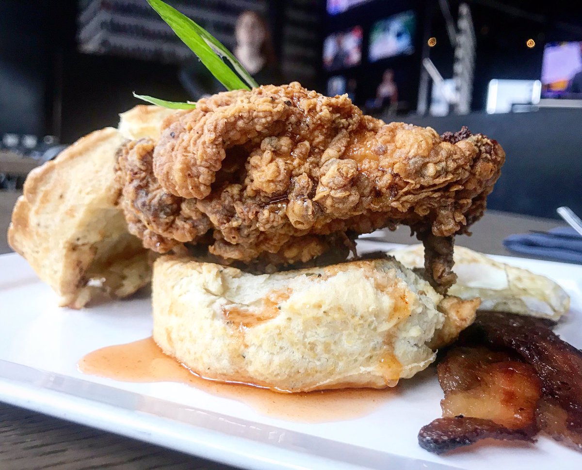 Fried chicken and biscuit, Sriracha honey glaze, bacon and eggs! #baconandeggs #sriracha