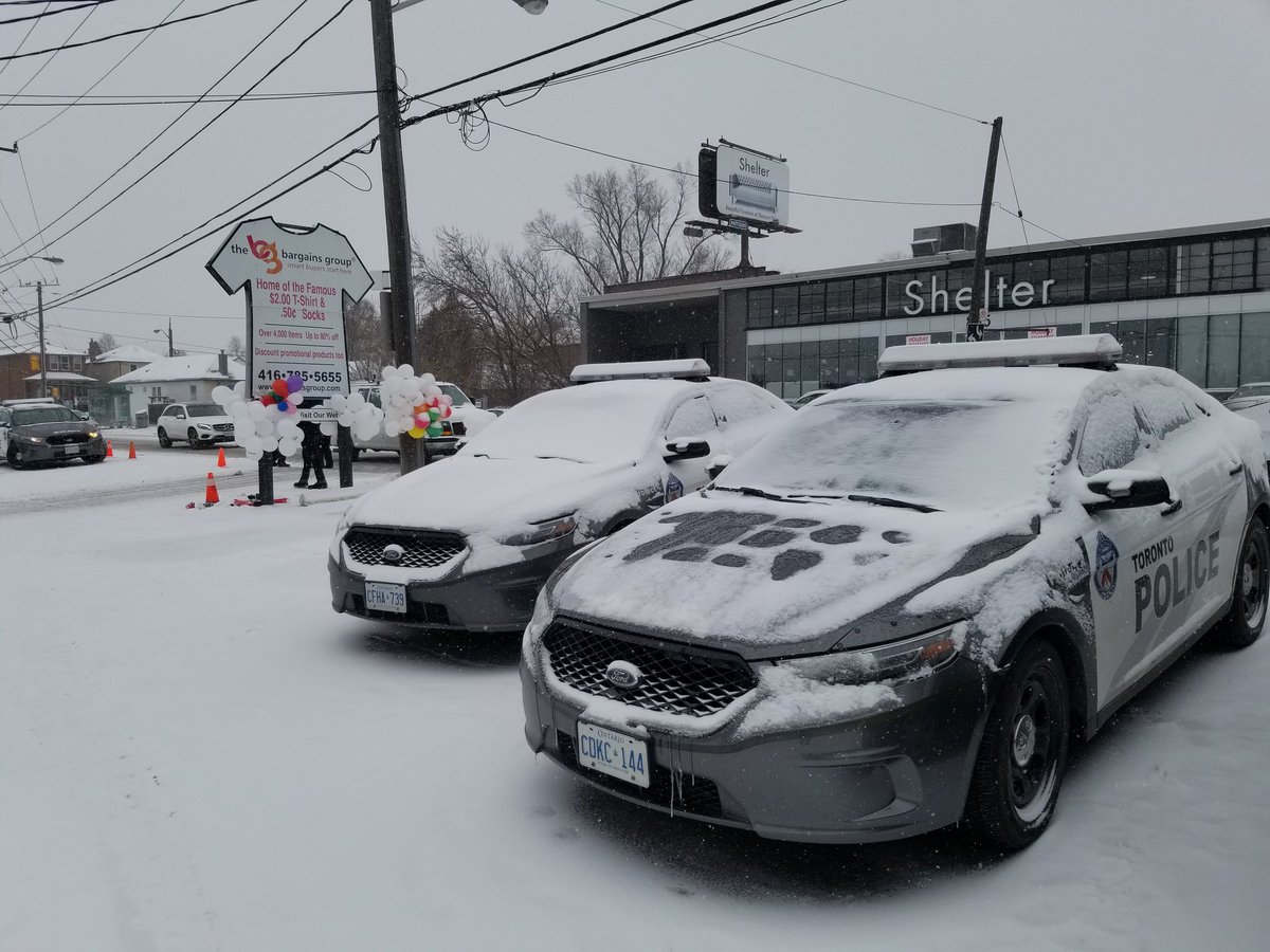 TorontoPolice's tweet photo. Huge thanks to Toronto cops in freezing temperatures directing traffic for trucks from 210 social service agencies to get into Caledonia Rd warehouse to load 3000 winter survival kits for distribution to people who are homeless. https://t.co/oCPSIIenkz #ProjectWinterSurvival ^sm https://t.co/NYRddEr0qr