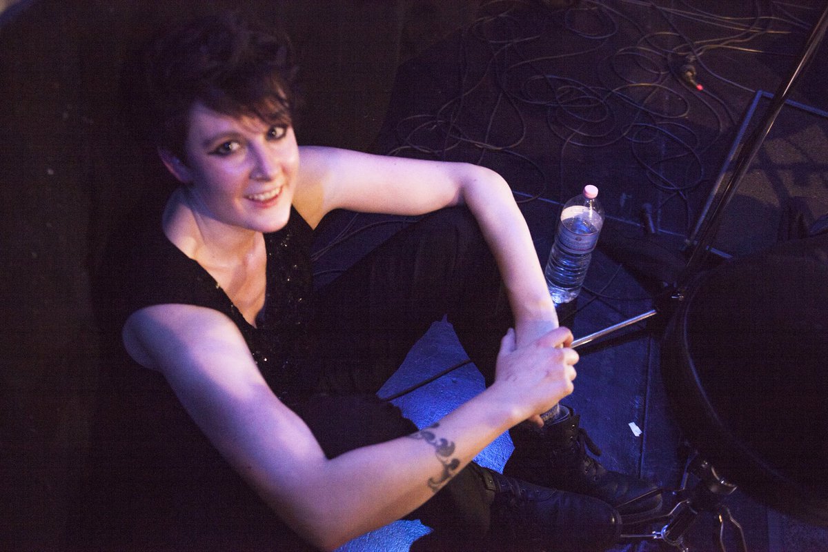 RAH_HELL's tweet photo. post concert exhaustion/bliss.
this photo was taken by David Hawkins - @DHIEnterprises - seconds after we (@TheErinyesBand) finished our gig at @WOSPBerlin last saturday. #happydrummer #drummess https://t.co/xCemYd4s70