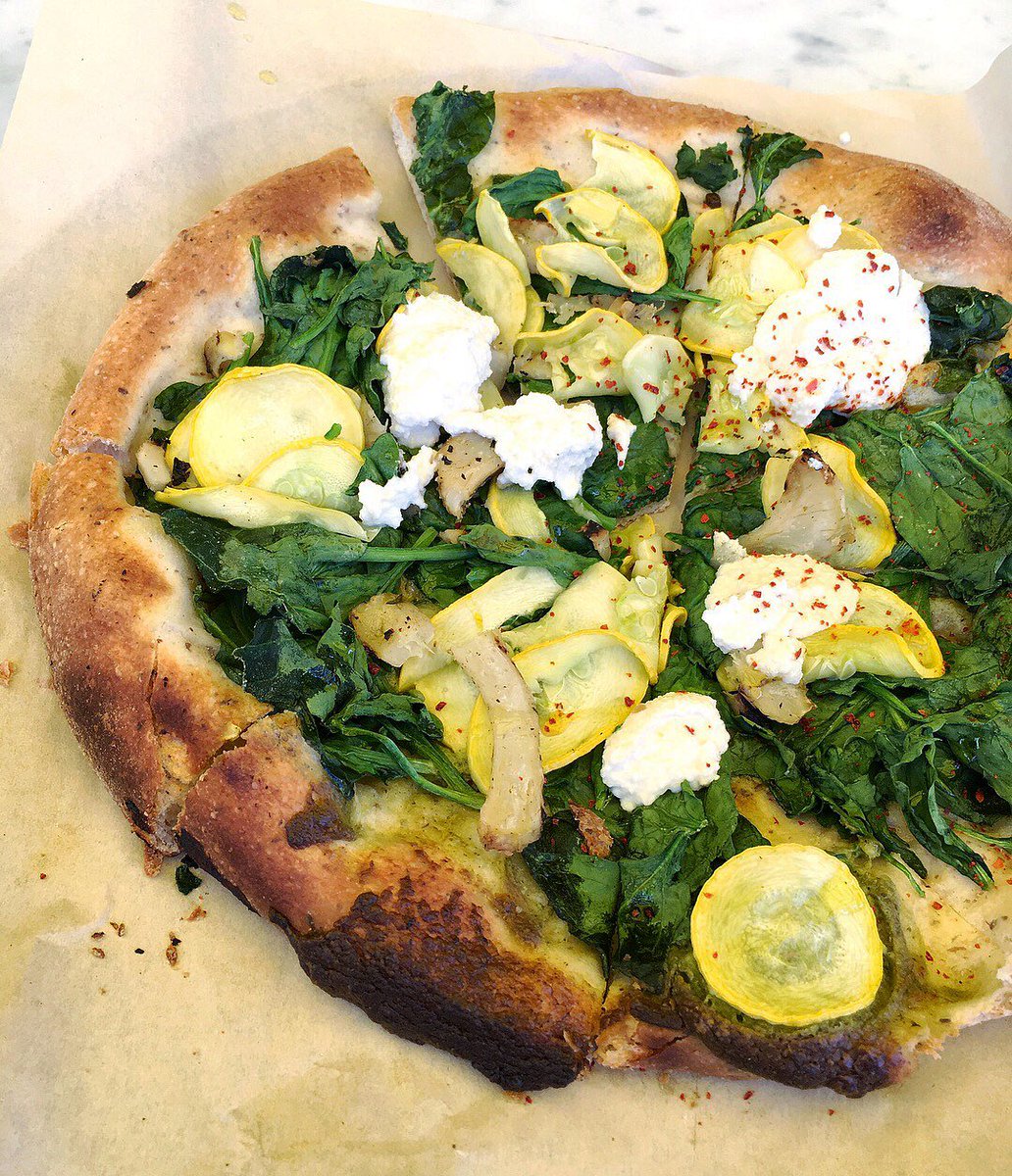 WellbeingCafes's tweet photo. Grilled Artichoke &amp; Pesto Pizza - artichoke, spinach, summer squash, black walnut pesto, lemon, aleppo chili, vegan almond ricotta 😜 @TrueFoodKitch #modernbaker #healthypizza #organicsourdough #fermentedfood #ferment #guthealth #organicbakery #bakery #pizza #pizzamania https://t.co/KmG0XUrKNA