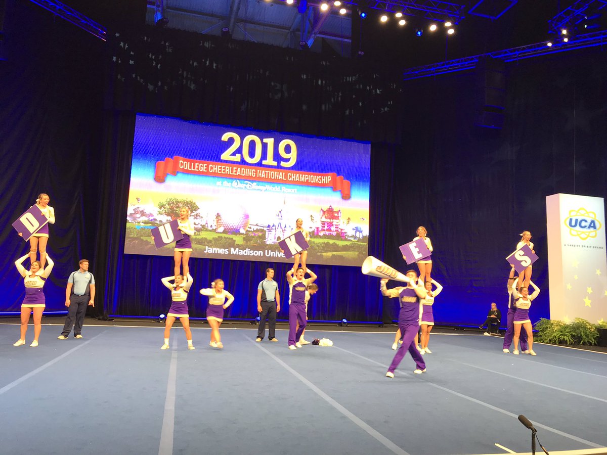UCAupdates's tweet photo. The Dukes from James Madison University took the mat with confidence during Small Coed DI Finals! #UCAnationals 💜🙌🏼 https://t.co/JbCTXAduB1
