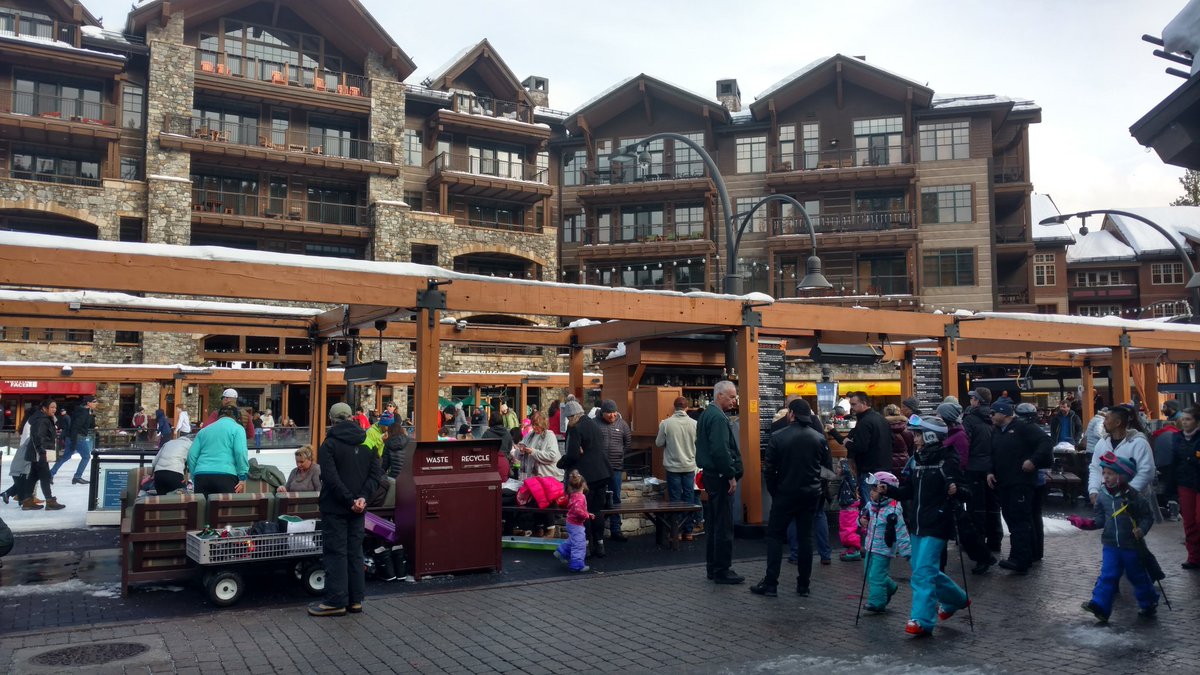 New #fashions #accessories encountered at a #skivillage. @Northstar_CA  #CanineCompanion with yellow #boots! #snowfun