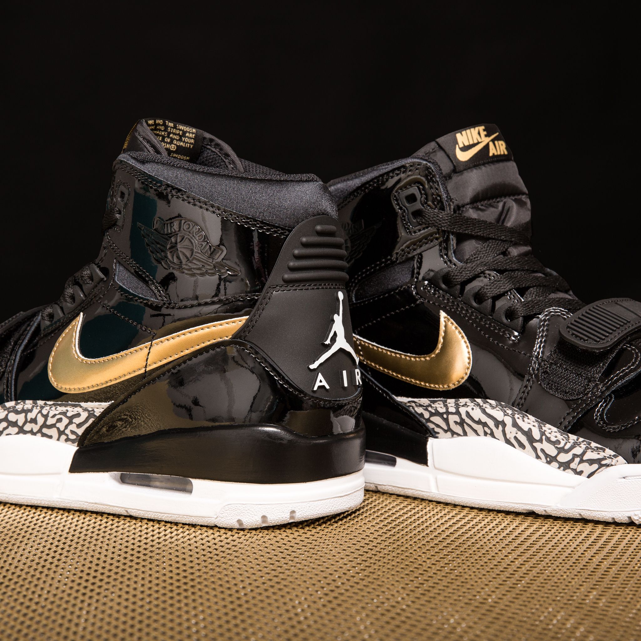 Air jordan legacy 312 black and gold 2025