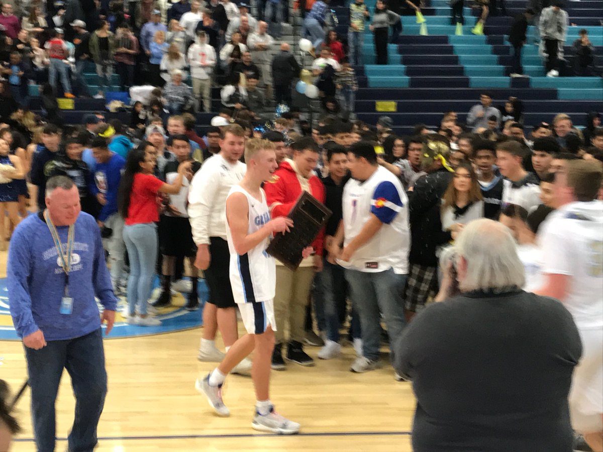 AnneGDelaney's tweet photo. .⁦@GWHSbasketball⁩ senior Jarod Clark accepts MVP plaque for #GreeleyCentral game. Tom Boyle Memorial Award. Then, he’s swarmed by teammates and fans. #greeleyhoops #rivalry ⁦@GTribSports⁩ https://t.co/eWyjHkLBai