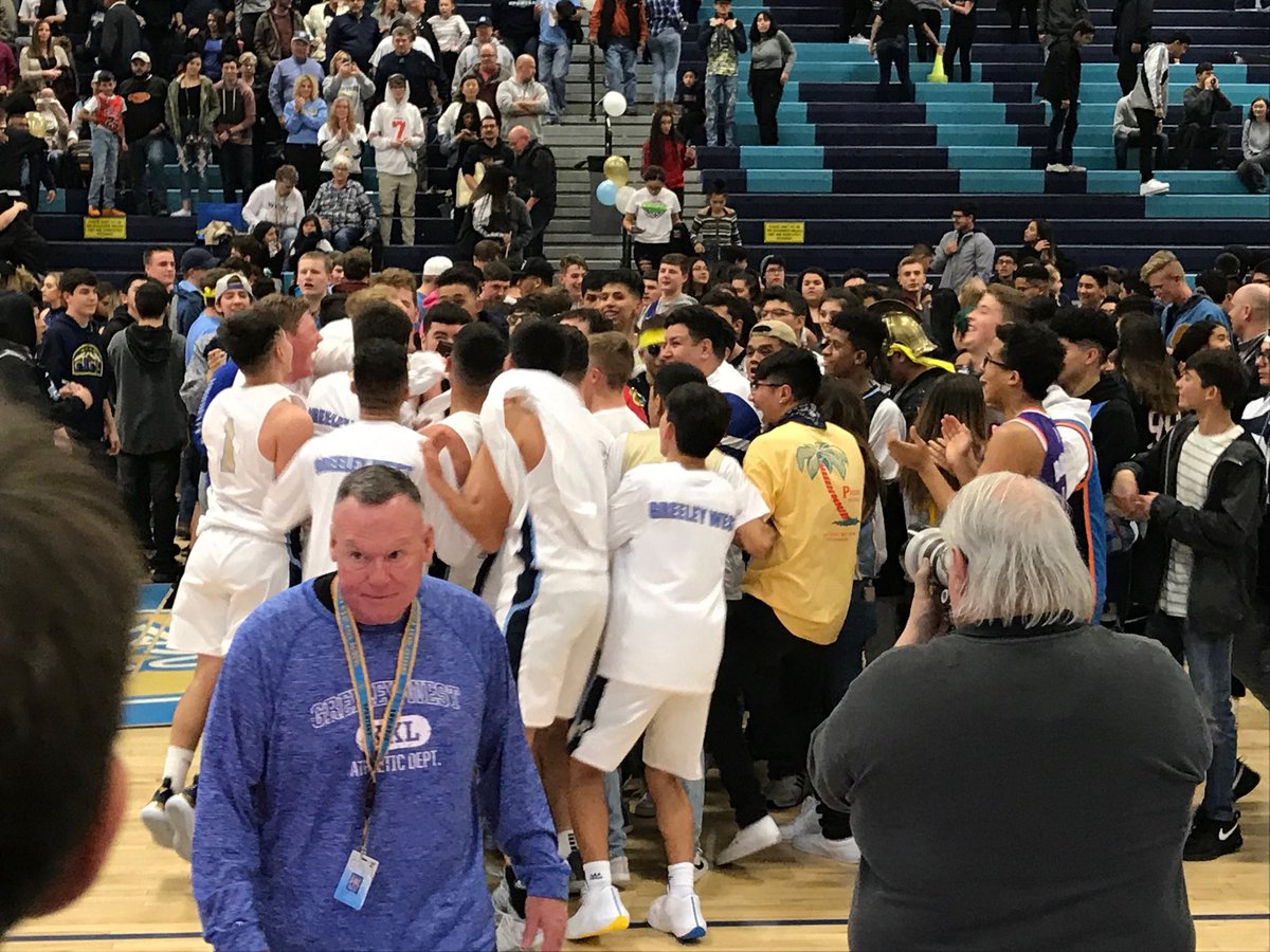 AnneGDelaney's tweet photo. .⁦@GWHSbasketball⁩ senior Jarod Clark accepts MVP plaque for #GreeleyCentral game. Tom Boyle Memorial Award. Then, he’s swarmed by teammates and fans. #greeleyhoops #rivalry ⁦@GTribSports⁩ https://t.co/eWyjHkLBai