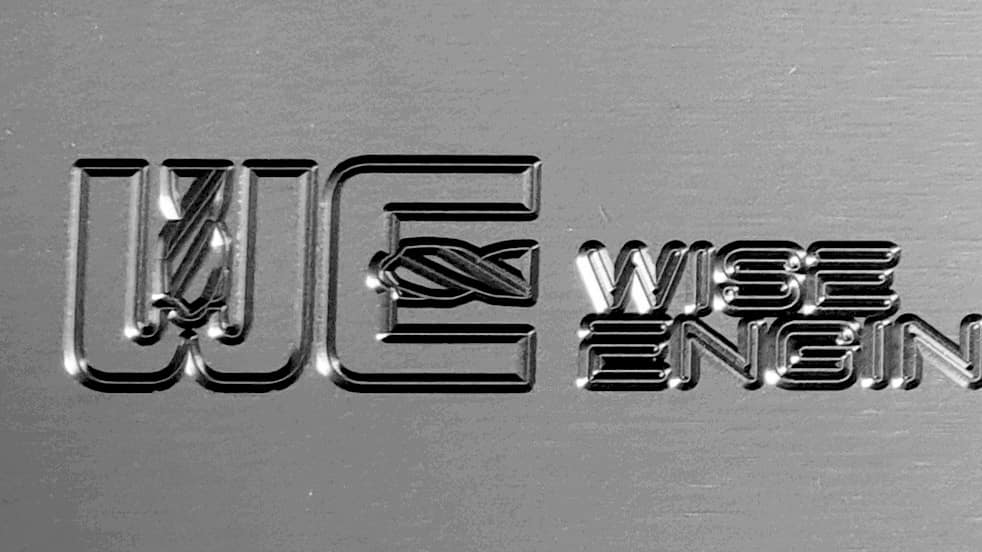 WiseEngineering's tweet photo. Engraving on a modified tool for our doosan sub spindle lathe. Using a ZCC 1.5mm ball end mill for the engraving and solid carbide end mill https://t.co/BzgLIx73Ij