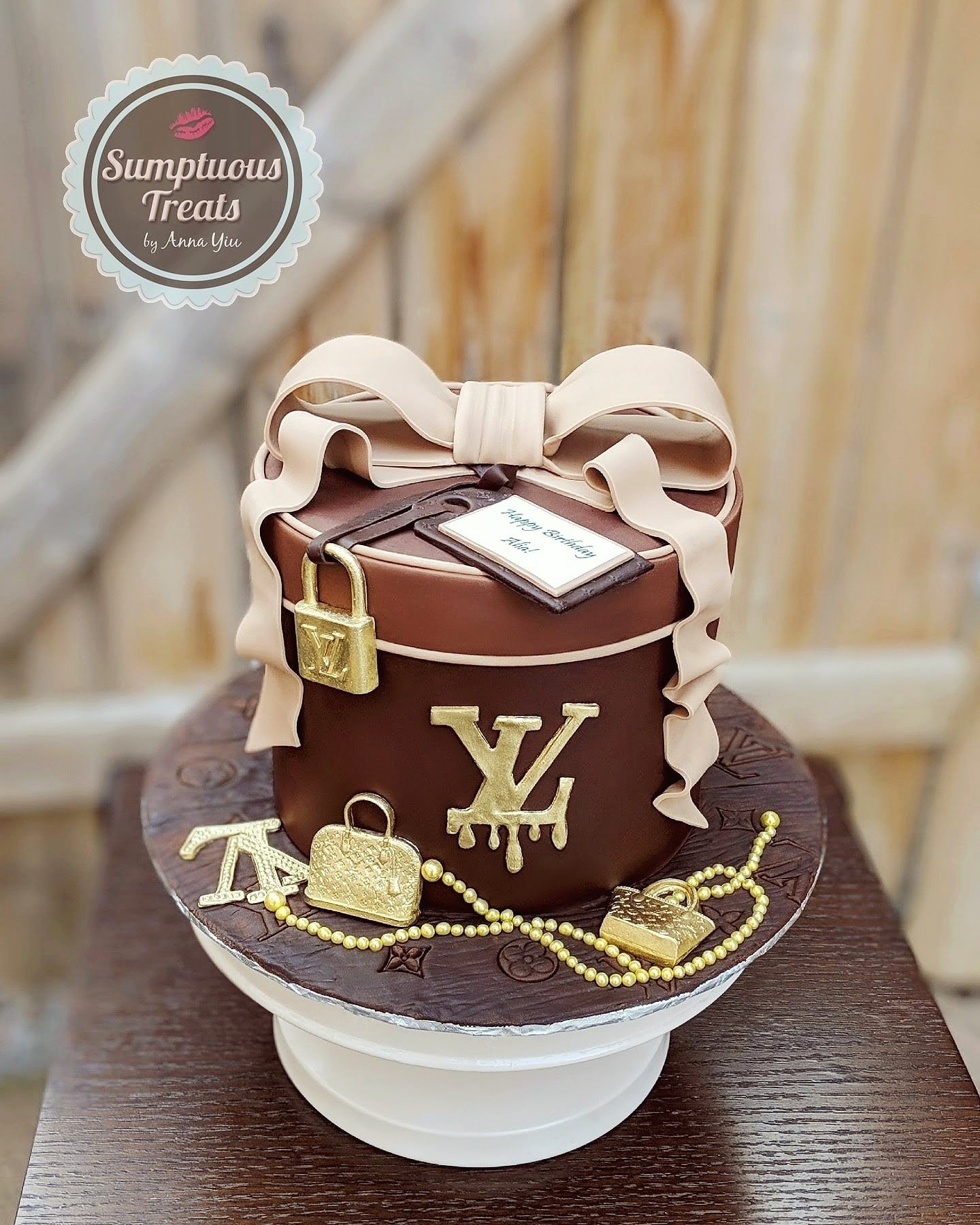 Working on this Customized Louis Vuitton Cake inspired cake #louisvu, cakes