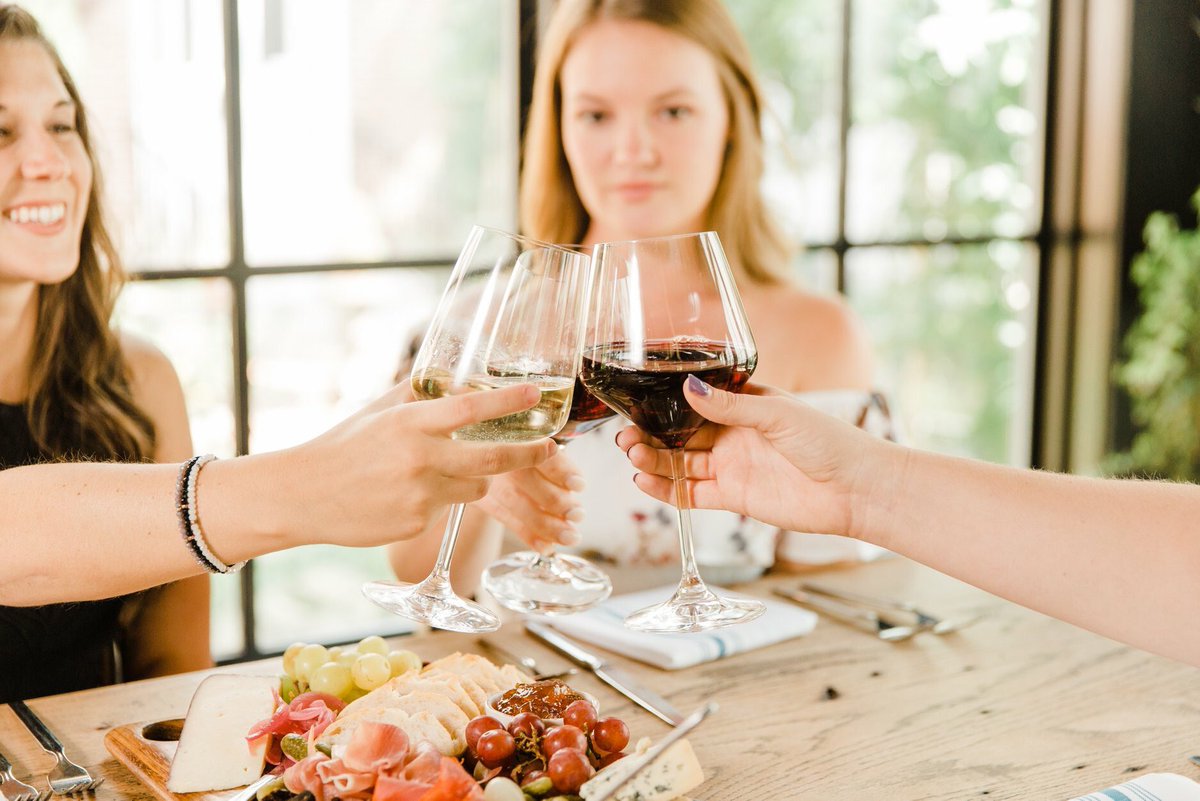 These #SundayFunday deals will keep you warm!🔥 Get half-priced wine by the glass + beer and $9 signature cocktails from 10a-3p and half off bottles of wine from 4p until close.🍷🍷