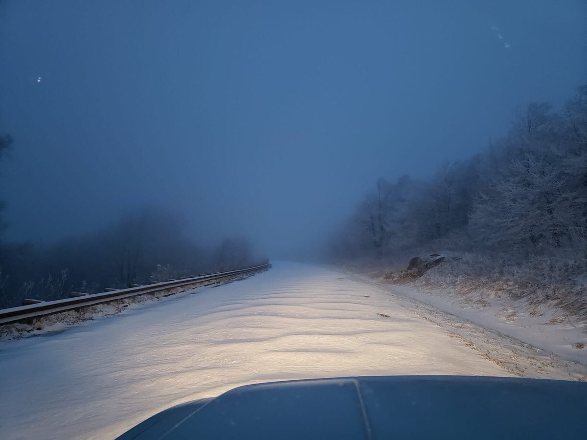 The Cherohala Skyway was covered with snow just before the sun came up this morning. Duane Foister braved temperatures in the teens to get this picture.