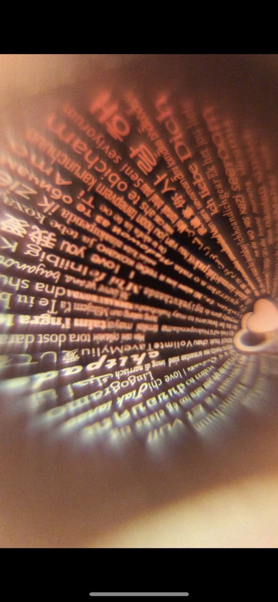 AIphaAmbassador's tweet photo. my boyfriend got me a necklace that when you shine a light thru it, it projects “I love you” in 100 different languages 😭❤️ https://t.co/zNFuYETPin