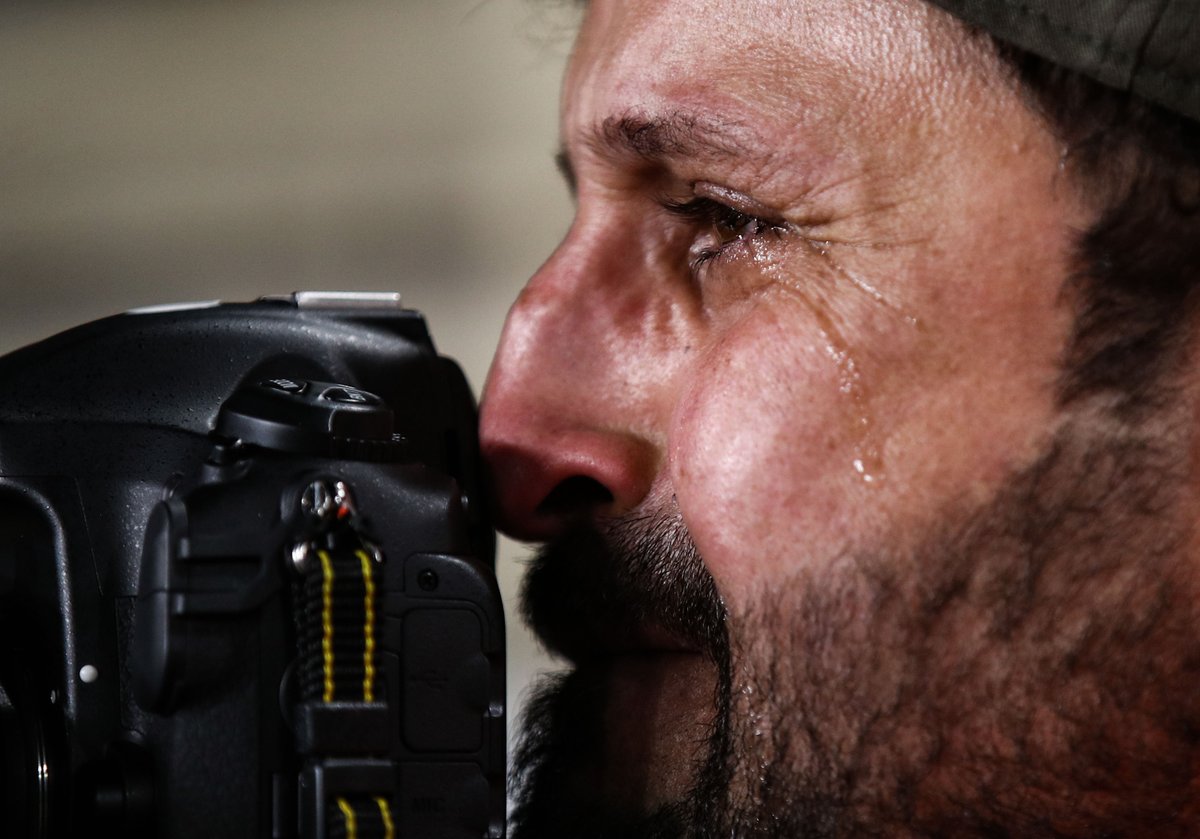 Footballtweet's tweet photo. An Iraqi photographer the moment his country got knocked out of the Asian Cup. 

😢🇮🇶 https://t.co/4v3jo4GdzT
