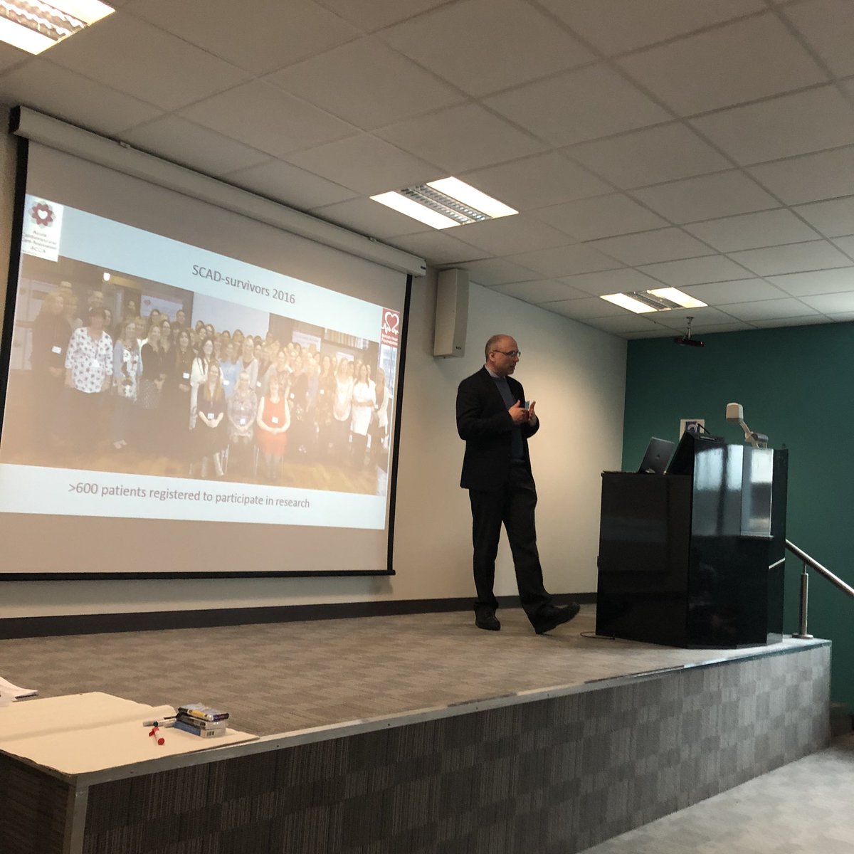 FmdBe's tweet photo. Prof David Adlam presenting at #FMD2019 Spontaneous Coronary Artery Dissection -Link with FMD at the First Uk and Ireland Patient Day on FMD. #fmd #scad #fmdscad #FibromuscularDysplasia #DFM #DSAC @beatscaduk @FmdsUk https://t.co/YTu7uGN1oS