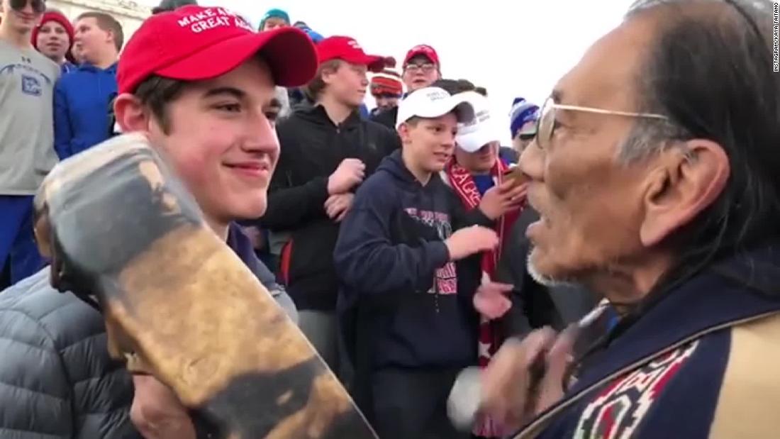 CNN's tweet image. A new video shows a different side of the encounter between a Native American elder and teens in MAGA hats cnn.it/2FOiyzV