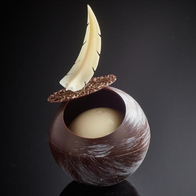 Celebrate the rare #LunarEclipse with the La Rose Noire chocolate moon, made with 69% single origin couverture and perfect for #vegans. #chocolateshell #instafood #chefinspiration #foodie #foodpic #cheflife #dessert #delicious #larosenoire