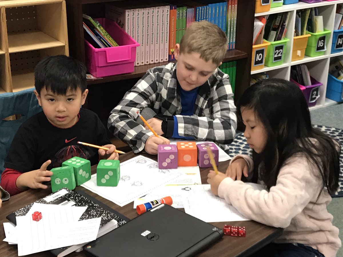 MrsWeller64's tweet photo. Practicing place value with cubes,  dice and cards is always so much fun!! #D64smiles #engagedd64 #Falcons64 https://t.co/MScL28ROYy