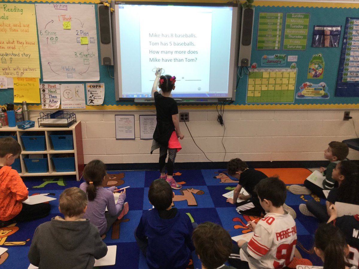 First graders tackle word problems as a math warm up. #MindsAtWork #DevelopingARamseyGraduate