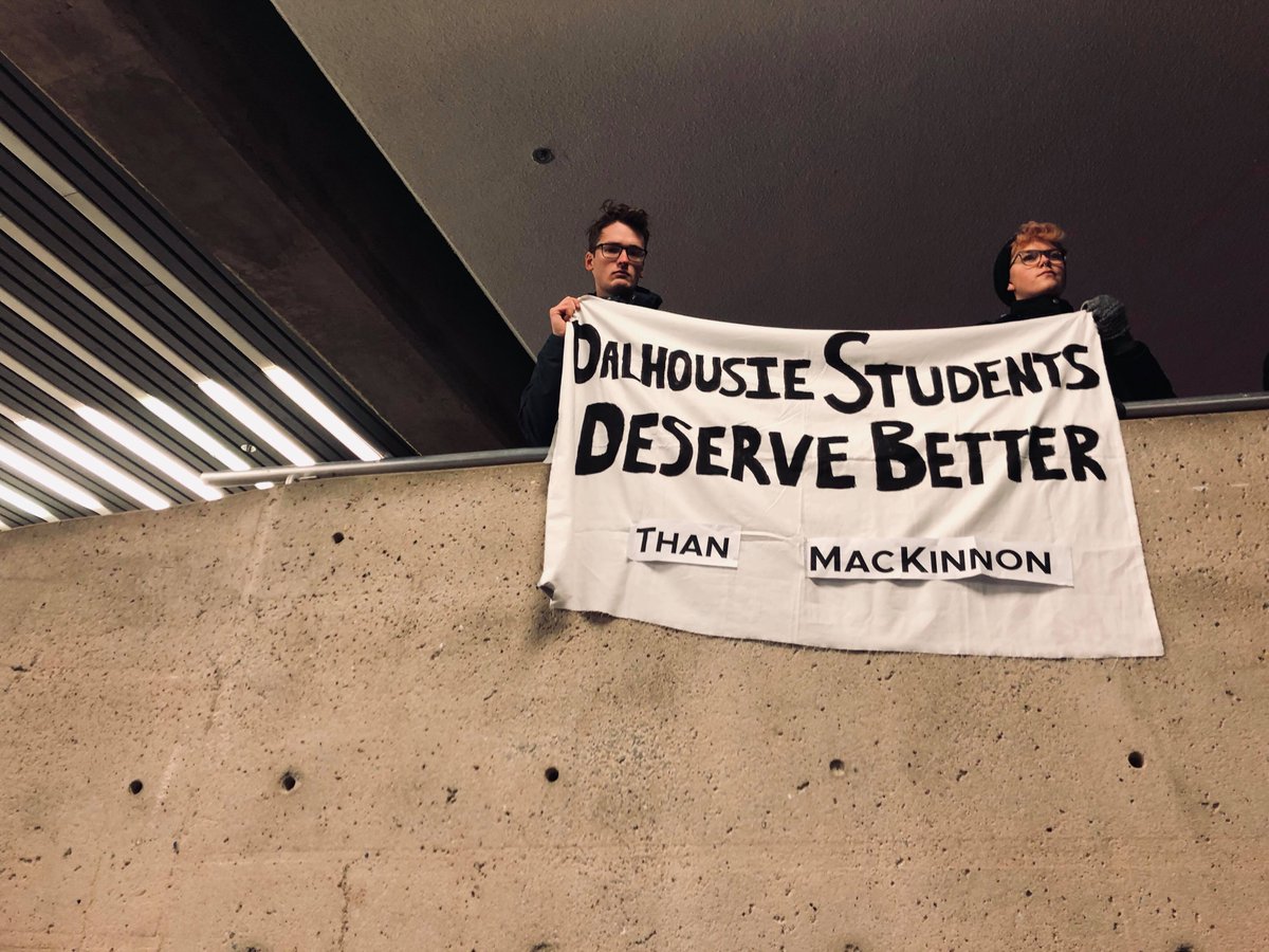 DivestDal's tweet photo. Today @DalhousieU students engaged in a silent action to address interim @DalPres MacKinnon’s blatant support of anti-Black and anti-Indigenous racism and with other forms of oppressive rhetoric, including opposition to fossil fuel divestment.
#DalDoBetter #NotOurPres #DivestDal https://t.co/Gylm0gRPIl