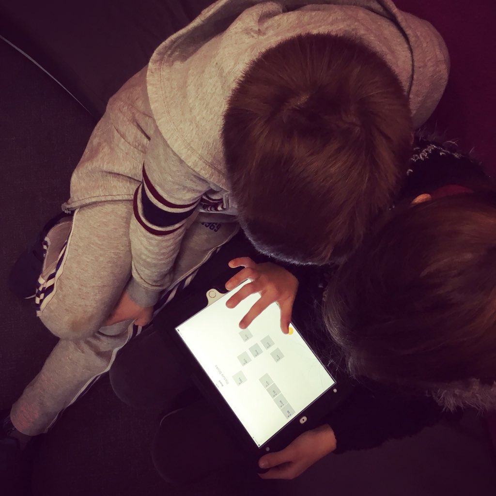 ASMLibrary's tweet photo. G2 students are at it again this year - learning about how the library is organized and how to find books independently. They are using @postit #postitplus app to alphabetize spine labels. https://t.co/VyZuAexEqn