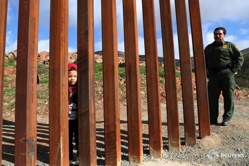 A boy from Honduras looks through the U.S. and Mexico border fence after being detained by U.S. Border Patrol in Tijuana, Mexico, and more photos of the day: http://reut.rs/2sFhW7O 📷 Shannon Stapleton