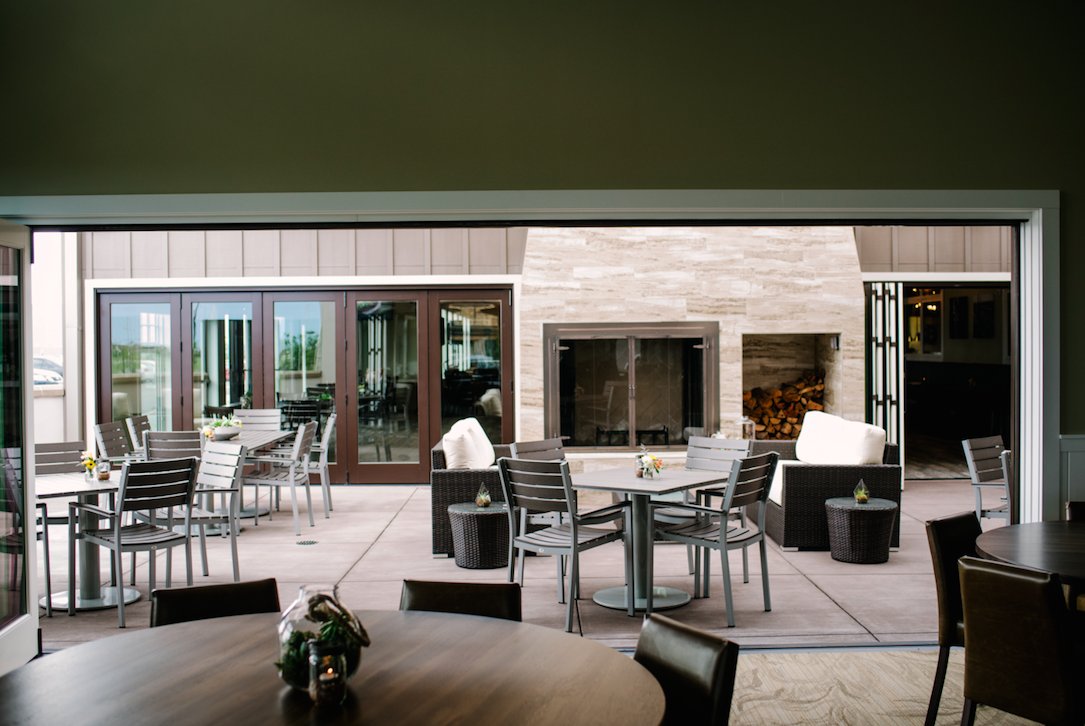 Our private West room has gorgeous access to the outside patio which boasts of a roaring fireplace and heat lamps. Perfect for you next event! What could you host in this space?