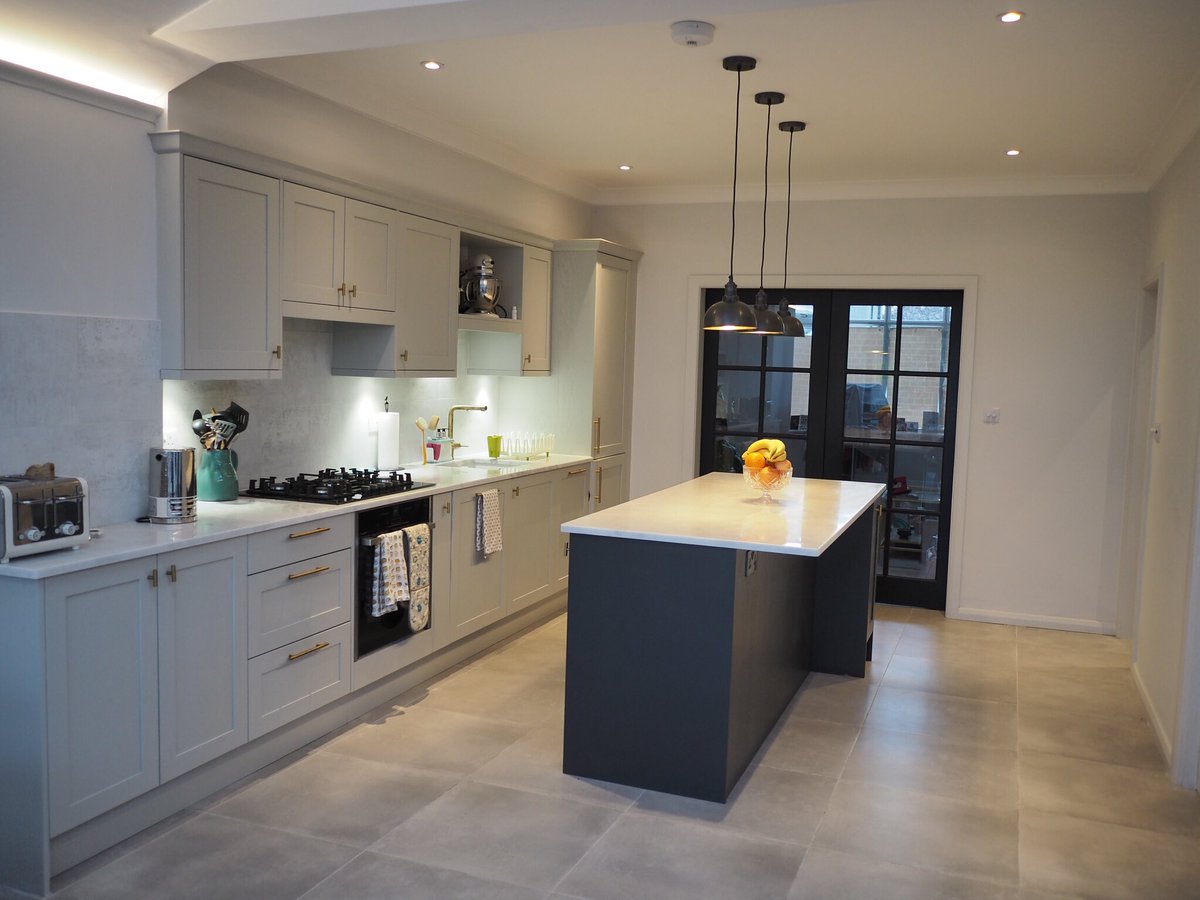 SarahJaneKit's tweet photo. Spot on Trend, the Aldana Kitchen from our Kitchen Stori Range in Light Grey and Graphite.  The thinner frame around this shaker door gives a sophisticated modern feel.  We have teamed this with Minerva Solid Acrylic Worktops in Carrara White. https://t.co/CLjNUXJSbM