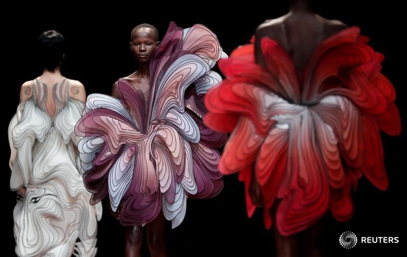 Models walk at the Iris van Herpen show, and more highlights from haute couture week in Paris: https://reut.rs/2HofD3e 📷 @benoit_tessier