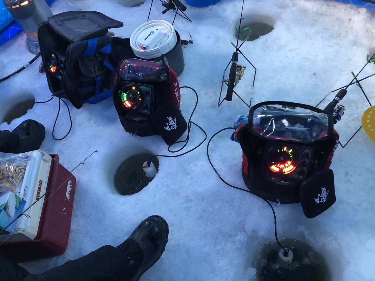 Holes drilled, shelter up, it’s time to get the Vexilars fired up to let us know what’s going on below. Dead sticks also stand as a second sentinel to walleye being active in the area. <a href="/vexilar/">Vexilar</a>