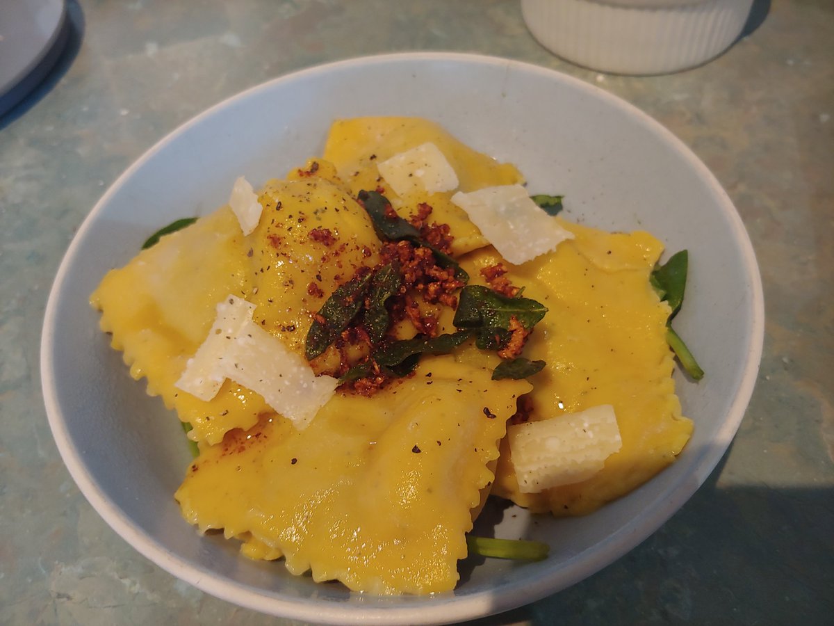 Pesmare's tweet image. Trying to cook from scratch a lot more. Here's my latest dish: pumpkin ravioli (in the dough) with spinach and feta, with burnt butter and sage sauce. Came out alright!