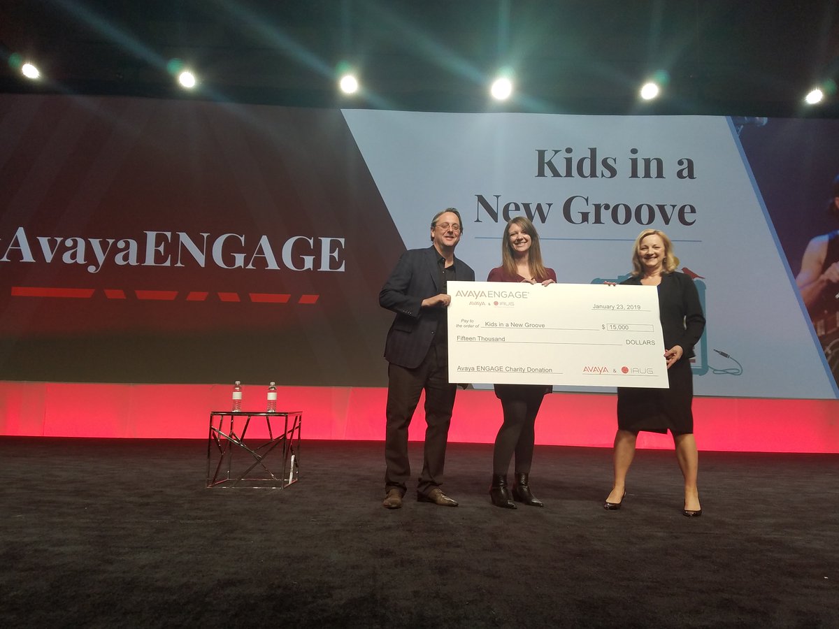 Avaya's tweet image. Along with @IAUG we’re proud to present $15,000 to @KidsGroove! #AvayaENGAGE #ExperiencesthatMatter