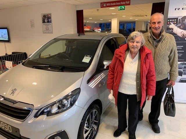 MotorMallGuern's tweet photo. Here is Motor Mall Guernsey customer Dorothy Vinning and her husband Mr Vinning collecting her new Peugeot 108. 

We thank them for their custom and wish them many happy miles in their new car. #Happyhandover https://t.co/kLXFtLv5pV