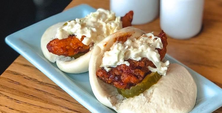 WalkEatNash's tweet photo. The @NashvilleScene #HotChickenWeek is on! In the spirit of this annual celebration, we gathered up our favorite ways to sample #hotchicken in new, creative forms. @OtakuSouthRamen, @pancho_leftys, @eatatchauhan and lots more: https://t.co/17sYg7qCy0 https://t.co/9zHnPIqtGW