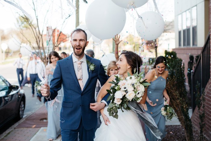 heartofncwed's tweet image. This wedding party PARADED across downtown Raleigh with a band, balloons, and confetti - and we think it might be the cutest wedding idea we've seen! #DTR #Raleigh  southernbrideandgroom.com/winter-wedding…