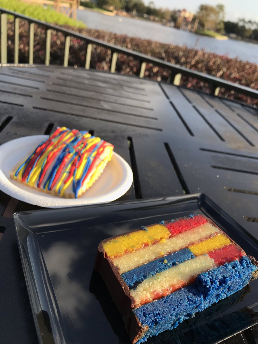 ThatDisFamily's tweet image. the cake is basically a giant rainbow cookie and I am here for it