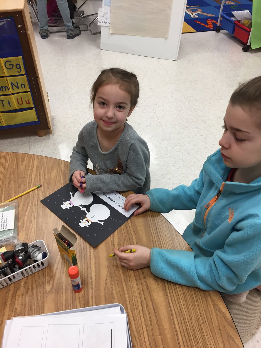 Working with our 5th grade buddies on what snowmen do at night