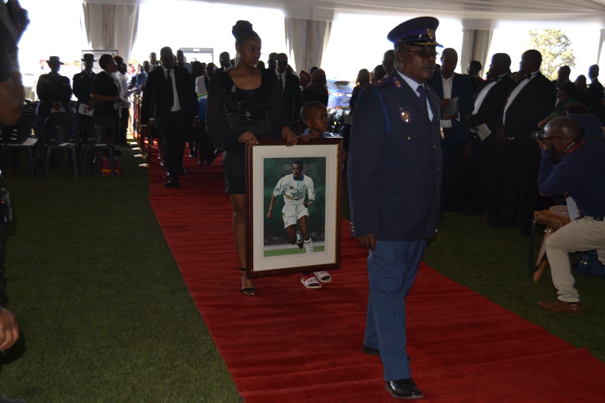 newsnoteSA's tweet photo. Pictures: #RIPMasinga his wife, Ntombi and children along with family members entered the marquee where the proceeding will commence. @IceT_ https://t.co/Iylhy9aEoD