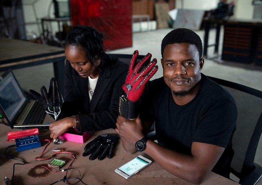 Becauseofthem's tweet photo. Meet The Kenyan Engineer Who Created Gloves That Turn Sign Language Into Audible Speech -- https://t.co/NwLQWOoyIi https://t.co/CaEYIK8RT0