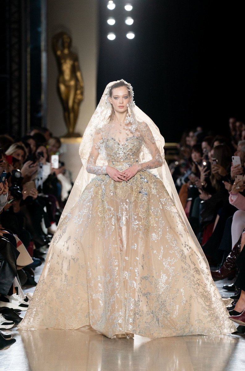 Here comes the hotly awaited #ElieSaab bride at Paris Haute Couture week! #Mesmerizingmoment #runwaymagic #BestLebaneseDesigner