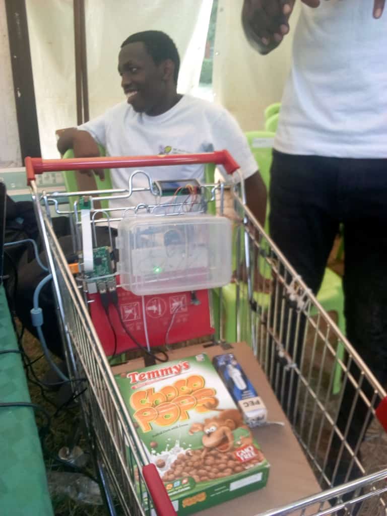 Nathanobu's tweet photo. Tired of long queues the supermarket? Shop using the smart trolley #SETRO #TechExpo9 @esagini2 @KNyagowa @arnoldmaina971 @TuskysOfficial @naivas_kenya @CarrefourGroup @cohenandove @lavvy_clara https://t.co/tZ0n5Aq50I