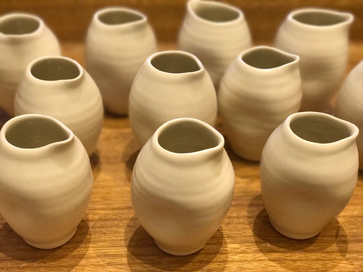 White dimpled bottles #potter #instaceramics #tabletopmatters