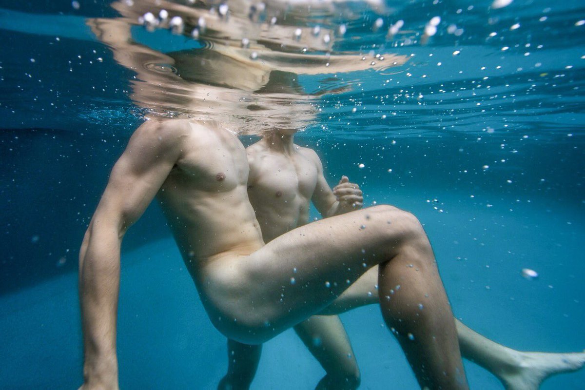 Two Hunks In The Swimming Pool